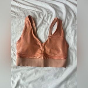 Peachy/Pink Fabletics sports bra, size M
